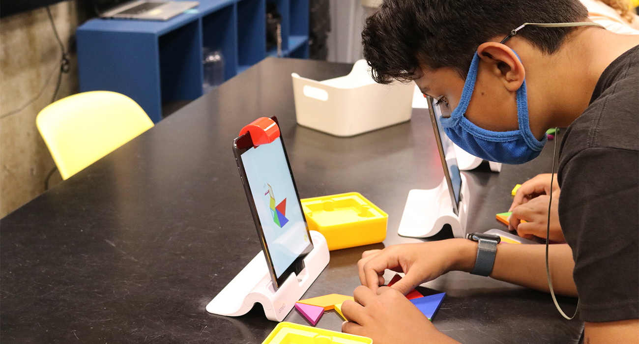 Boy_working_on_stem_puzzle