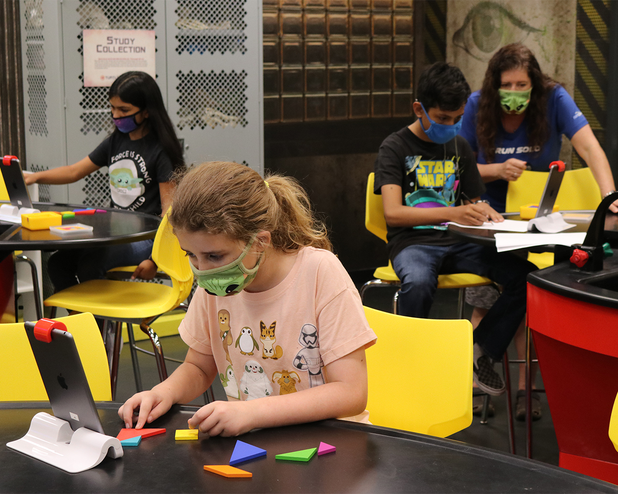 students_and_teacher_in_stem_class