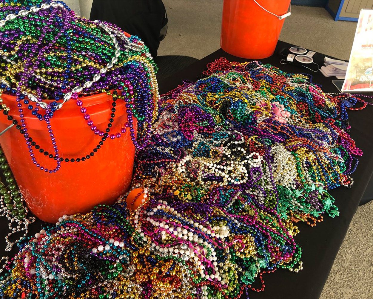 table full of beads from the bay