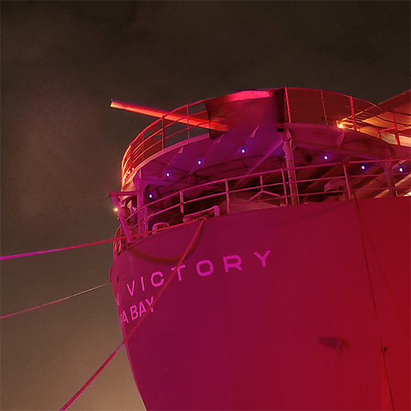 american victory ship in red lights