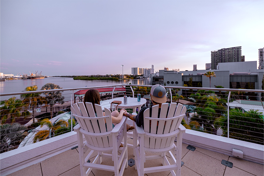Couple on the rooftop looking at Tampa Bay