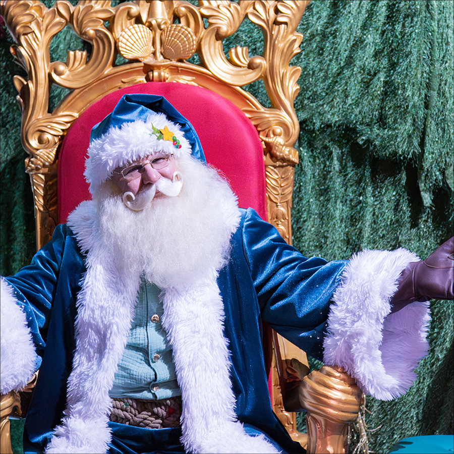 Santa waiting to greet guests at YuleTides at the Florida Aquarium