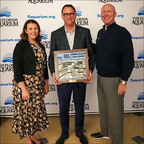 Roger Germann, Kristin Greco, and John Couris at the EOY Board Meeting at the Florida Aquarium