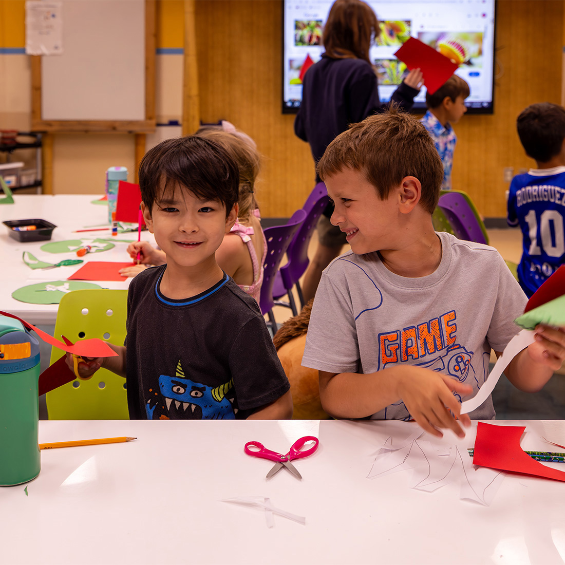 Two boys working on their craft during summer AquaCamps
